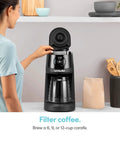 Woman using Brew Choice Pod And Carafe Coffee Maker For K Cup Pods Or Ground Coffee, 12 Cup Capacity, Auto Brew Sense Detects Pod Or Filter