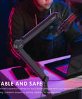 Premium Microphone Boom Arm With Desk Mount, 360 Rotatable And Fully Adjustable, shown in gaming setup with laptop.