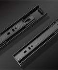 Heavy Duty Black Cold Rolling Steel Drawer Slides Smooth Glide three section cabinet rails on a dark background.