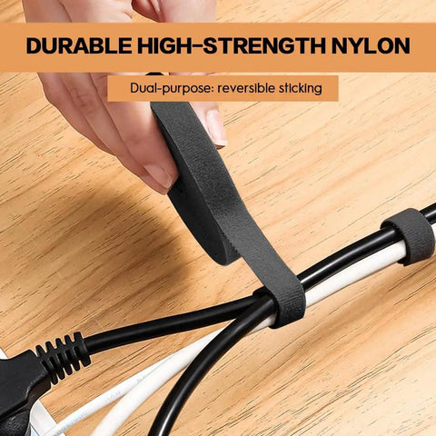 Hands using Six Point Five Foot Two Roll Adjustable Cable Ties Reusable Hook and Loop Fastening for Cable Organizing and Wire Management Black