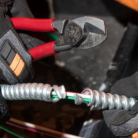 Sleek Six Point Five Inch Compact Cable Cutter Featuring High Leverage Action For Hella Easy Aluminum And Copper Wire Snipping With Zero Mechanical Hassle And Top Shelf American Forged Steel cutting through aluminum wire.
