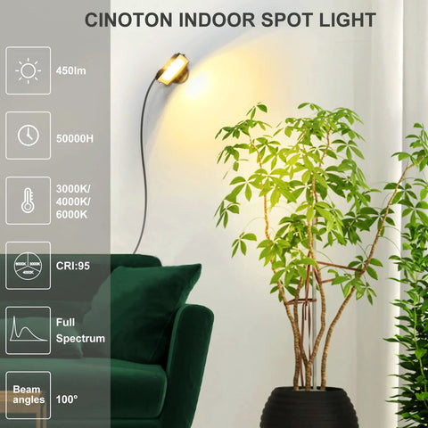 LED Spot Light Indoor 2 Pack With 120V Accent Uplight, spotlight illuminating a plant beside a green couch indoors.