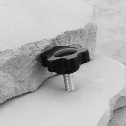 Ten Pcs 5mm Star Socket Cap Screws M5x10mm shown between stone slabs, non-slip star head, plastic and carbon steel, no tools needed.