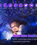 Child smiling while using Star Projector Night Light For Bedroom With Galaxy Ocean Wave Effects, Kids And Teens Ceiling Projector, Music Speaker And White Noise Sound Machine, 8 Scenes And 14 Color Options projecting colors on ceiling.