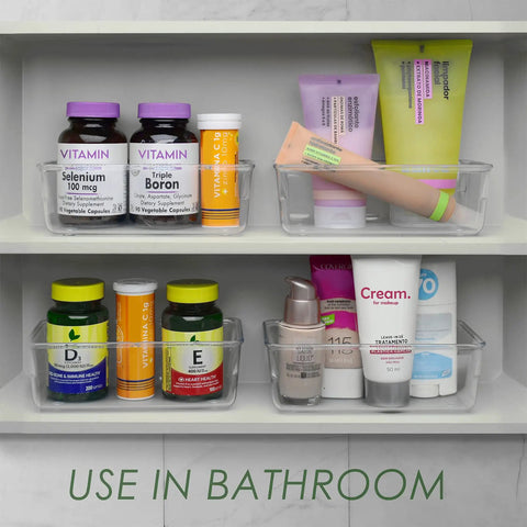 Clear Drawer Organizer Set Of 4 Pieces For Office, Home, Kitchen And Makeup Storage, Grab And Go Crystal Clear Plastic Modular Box Trays For Junk Drawers on bathroom shelf, showcasing vitamins and skincare items.