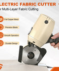 Gearpass 250W Electric Fabric Cutter With Extra 4-Inch Rotary Blade And Auto Sharpener handheld electric cutter in use on fabric.