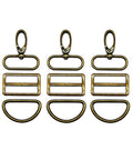 Top Shelf Swivel Snap Hooks Paired With D Rings And Easy Gliding Tri Glide Slides In Solid Antique Bronze Casting measuring 1.5 inches wide.
