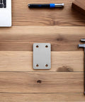 Straight Brackets Set For Wood Furniture Repair, stainless steel piece with 5mm holes on wooden surface with tools