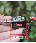 DC 24V Linear Push-Pull Solenoid Electromagnet Open-Frame Spring Magnet Plunger With 10mm Stroke in hand showing measurements
