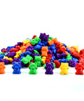 Hella Cool Big Time 120 Piece Math Manipulatives Counting Bear Set With Vibrant Six Color Blocks, colorful plastic bears pile with three gram units.
