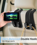 Top Shelf Universal Car Seat Headrest Hooks 2 Pack Suede Leather Bag Holders For Purses Coffee Mugs And Grocery Totes, black double hooks in car.