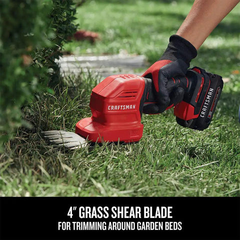 V20 4 Inch Cordless Handheld Grass Trimmer used for trimming grass edges near garden beds
