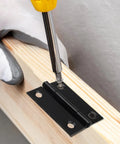Installing 20 Pack 2 Inch Mini Butt Hinges In Black on wood with screwdriver, featuring rust-resistant stainless steel for DIY projects.