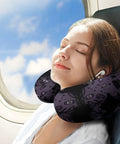 Woman using Purple Black Goth Spooky U Shaped Travel Pillow for Neck Support on plane, memory foam headrest, comfortable travel accessory