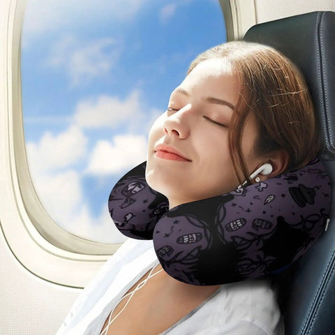 Woman using Purple Black Goth Spooky U Shaped Travel Pillow for Neck Support on plane, memory foam headrest, comfortable travel accessory