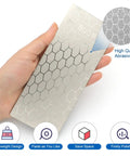 Hand holding Knife Sharpening Stone Set With Five Grits 400 600 800 1000 1200 Including Extra Fine And Coarse Plates Non Slip Base Honeycomb
