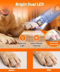 Smooth Sail Five Speed Dog Nail Grinder With Bright Led And Dust Bucket For Zero Drama Furbaby Paw Care Usb Powered Whisper Quiet Electric Grooming Tool For Pups And House Cats Blue in use with dog paw and LED light.