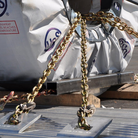 Beefy Grade 70 Binder Chain With Clevis Grab Hooks Five Sixteenth Inch By Sixteen Foot Heavy Duty Tie Down in use for hauling