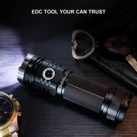 Beast Mode 3500 Lumen USB C Rechargeable Flashlight for Camping and Hiking on table with watch and keys