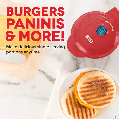 Dash Mini Maker Indoor Electric Grill Perfect For Compact Kitchen Dorms And Small Spaces Quick One Step Setup Even Heating Surface with cooked paninis and melted cheese.