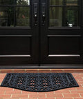 Heavy Duty Rubber Doormat That Stays Put With 12 Pound Weight 24 By 39 Inch Outside Front Door Mat For Mud Dirt Scraper Non Slip Drainage All Weather 100 Percent Rubber Mats in front of black double doors on brick porch