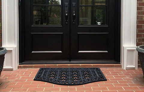 Heavy Duty Rubber Doormat That Stays Put With 12 Pound Weight 24 By 39 Inch Outside Front Door Mat For Mud Dirt Scraper Non Slip Drainage All Weather 100 Percent Rubber Mats in front of black double doors on brick porch