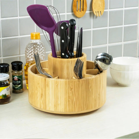 Large Bamboo 360 Degree Rotating Pencil Holder Desk Organizer with 11 compartments holding kitchen tools on countertop