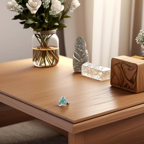 No Fuss Blue Floral Ceramic Cabinet Knob on wood table with decor items, part of 6 pack with single hole design for cabinets