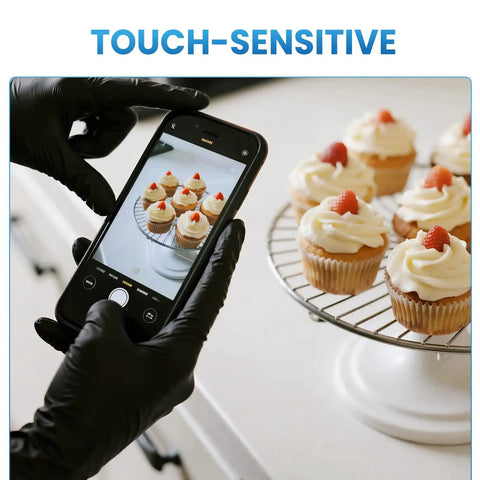 Person photographing cupcakes while wearing Solid Black Nitrile Gloves Large 100 Pack Heavy Duty Disposable Latex Free Powder Free Medical Exam And Food Safe Gear.
