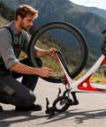 Man using 1 Pair Bike Handlebar Stand With Silicone Straps, Quick Release Bicycle Repair Bracket on mountain road
