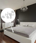 Kickass Upholstery Twist Pins Clear Heads 100 Piece Set Hella Sturdy Bed Skirt Fasteners on a bed with gray cover.