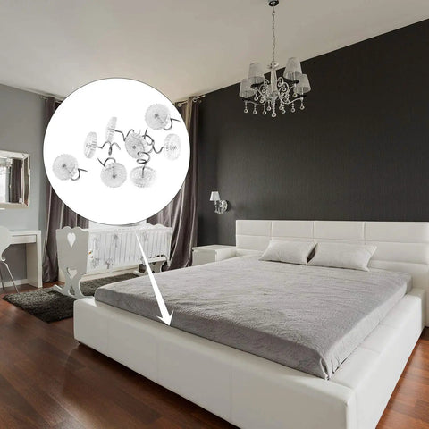 Kickass Upholstery Twist Pins Clear Heads 100 Piece Set Hella Sturdy Bed Skirt Fasteners on a bed with gray cover.
