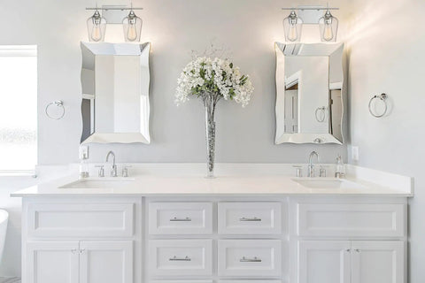 Octave Bohemian Clear Glass Bathroom Vanity Wall Light Two-Light Fixture With Boho Chic Vibe above a double sink vanity