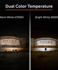 Outdoor Solar Flood Light in Black Cast Aluminum with Warm White 2700K LEDs lighting a sign, dual color temperature display