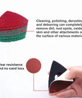 All In One 133 Piece Oscillating Tool Sanding Pads Kit with focus on stack of triangular pads and hand holding pad.