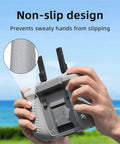 Non-slip Silicone Case Cover For DJI RC 2 Remote Controller held outdoors, showing anti-slip grip pattern.