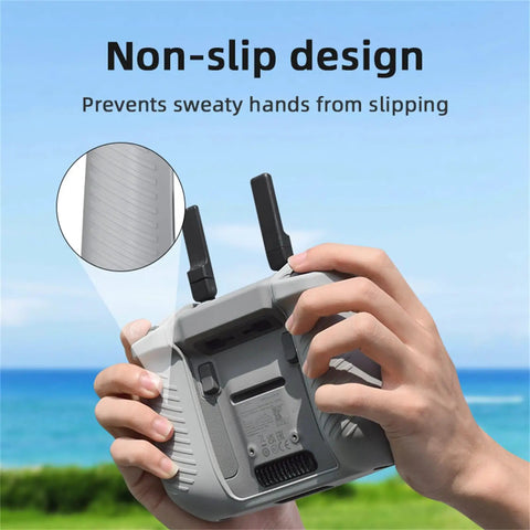 Non-slip Silicone Case Cover For DJI RC 2 Remote Controller held outdoors, showing anti-slip grip pattern.