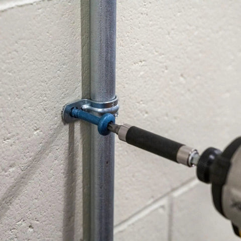 Installation of 100 Pk 3/16 By 2 1/4 Inch Pan Head Masonry Screws Star Socket Self Tapping Concrete Fasteners in wall.