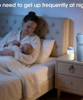 Keep Those Milk Bottles Ice Cold On The Go With This 20 Oz Breast Milk Cooler Cup beside sleeping mom and baby.