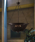 Heavy Duty Black Ceiling Pendant Light With Tassel Aluminum Chain Adjustable Hanging Chandelier For Vintage Cafe And Tea House Slick Finish, seen hanging in a modern space.