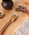 Two Pack Fire Pit Thermocouples Replacement 60x1 Cm 23.6x0.4 In with tools on wooden surface.