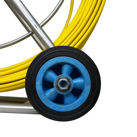 Close-up of Pro Grade 8MM 150M Fiberglass Duct Rodder wheel and yellow cable for electrical installations