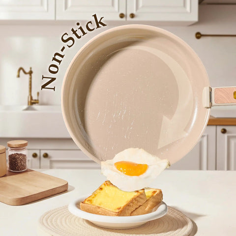 Nonstick Ceramic Cookware Set With Detachable Handle For Everyday Cooking, frying egg sliding out of pan in kitchen
