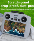 Silicone Case Cover For DJI RC 2 Remote Controller protects screen, prevents drops, scratches; grey silicone case on rocks.