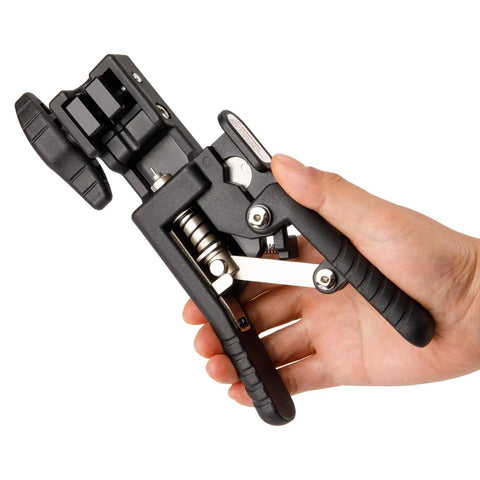 Hand holding Hydraulic Disc Brake Hose Cutter And Driver 2 In 1 Bike Tool For Clean Cuts And Easy Valve Insertion