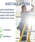 Woman installing Six Inch LED Recessed Can Light For New Construction With Air Tight IC Housing Sloped Ceiling Compatible TP24 Base