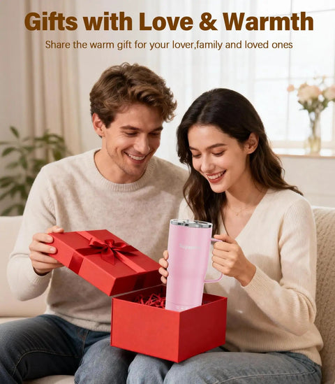 Couple smiling while unboxing a Self Heating Coffee Mug 20oz Electric Temp Control Warmer in a gift box.