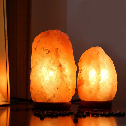 Two glowing Himalayan salt lamps using Replacement 15 Watt Dimmable E12 Salt Lamp Bulb Warm White 1.9 Inch Fit For Himalayan Salt Lamps And Candle Warmers With Long Lasting Performance Value Pack Of 12