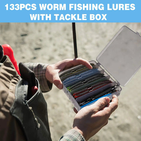Person holding 5.5 Inch Wacky Worm Lure Kit With 133Pcs Soft Plastic Lures, Grub Baits, Hooks, O Rings, Weights, in tackle box