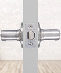 Side view of Six Pack Satin Nickel Privacy Locking Wave Door Levers For Interior Doors, installed on a white door panel.